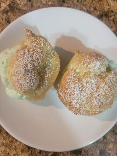 Cream puffs with pistachio whipped cream