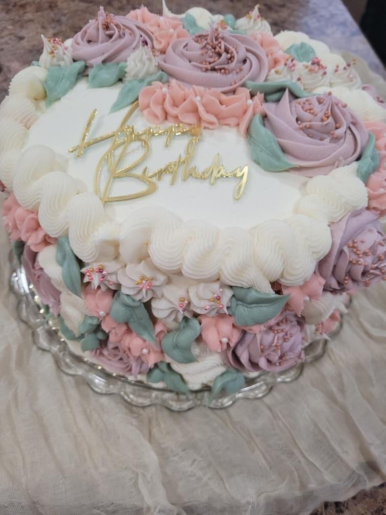 Vanilla cake with raspberry filling &amp; white chocolate cream cheese frosting